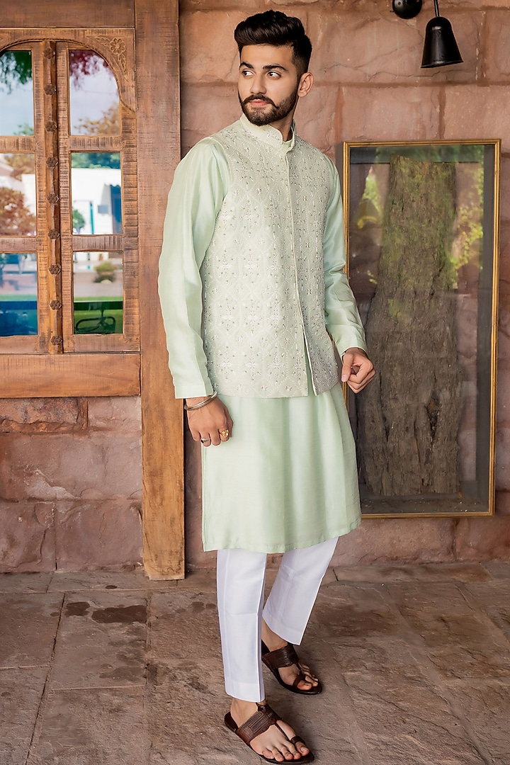 Saadgi Sage Green Raw Silk Resham Embroidered Nehru Jacket Set by ABHIPRI