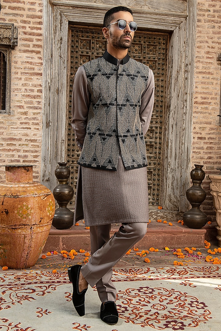 Black Dupion Raw Silk Blend Aari Embroidered Nehru Jacket by Abkasa at Pernia's Pop Up Shop