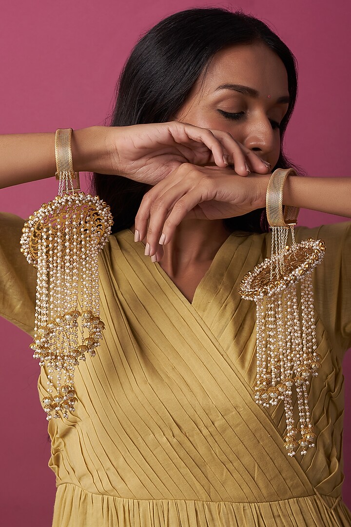 Gold Finish Kaleeras With Faux Pearls & Beads by Beabhika at Pernia's Pop Up Shop