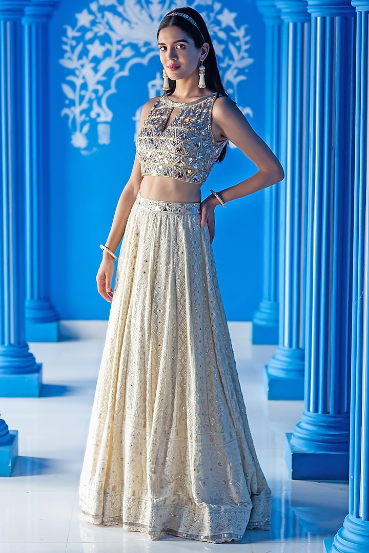 Ivory Georgette Thread & Mirror Hand Embroidered Lehenga Set by Aaryaa By Kashveen Kohli