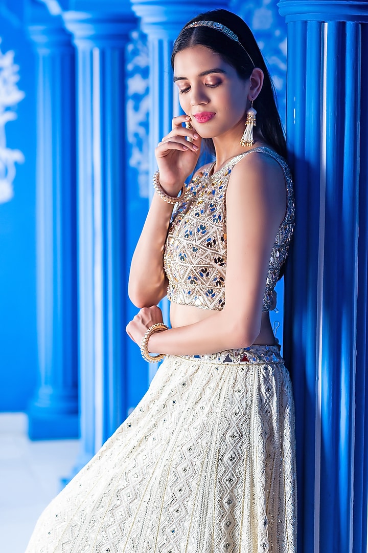 Ivory Georgette Thread & Mirror Hand Embroidered Wedding Lehenga Set by Aaryaa By Kashveen Kohli at Pernia's Pop Up Shop