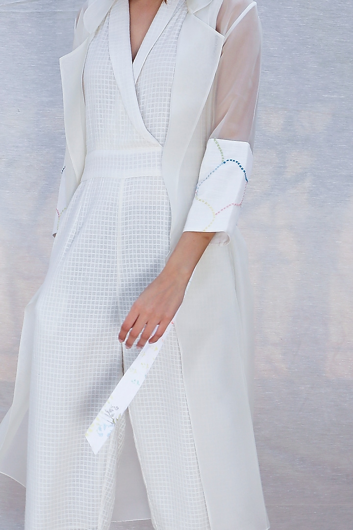 Ivory Textured Jumpsuit With Long Jacket by Arcvsh by Pallavi Singh at Pernia's Pop Up Shop