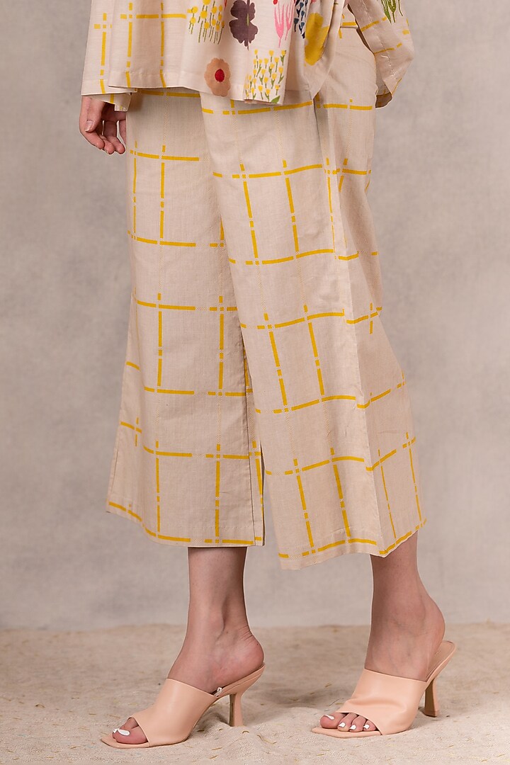 Sand & Yellow Printed Flared Pants by Arcvsh by Pallavi Singh at Pernia's Pop Up Shop
