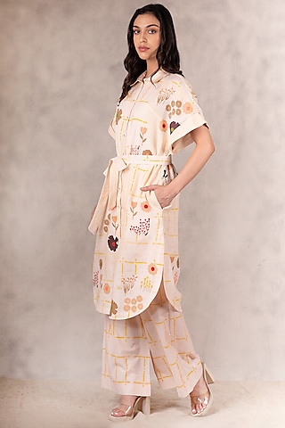 Peach Printed Flared Pants by Arcvsh by Pallavi Singh