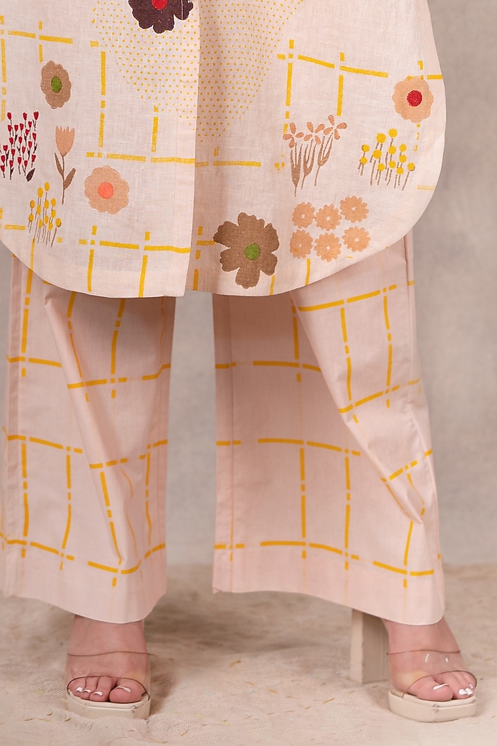 Peach Printed Flared Pants by Arcvsh by Pallavi Singh at Pernia's Pop Up Shop
