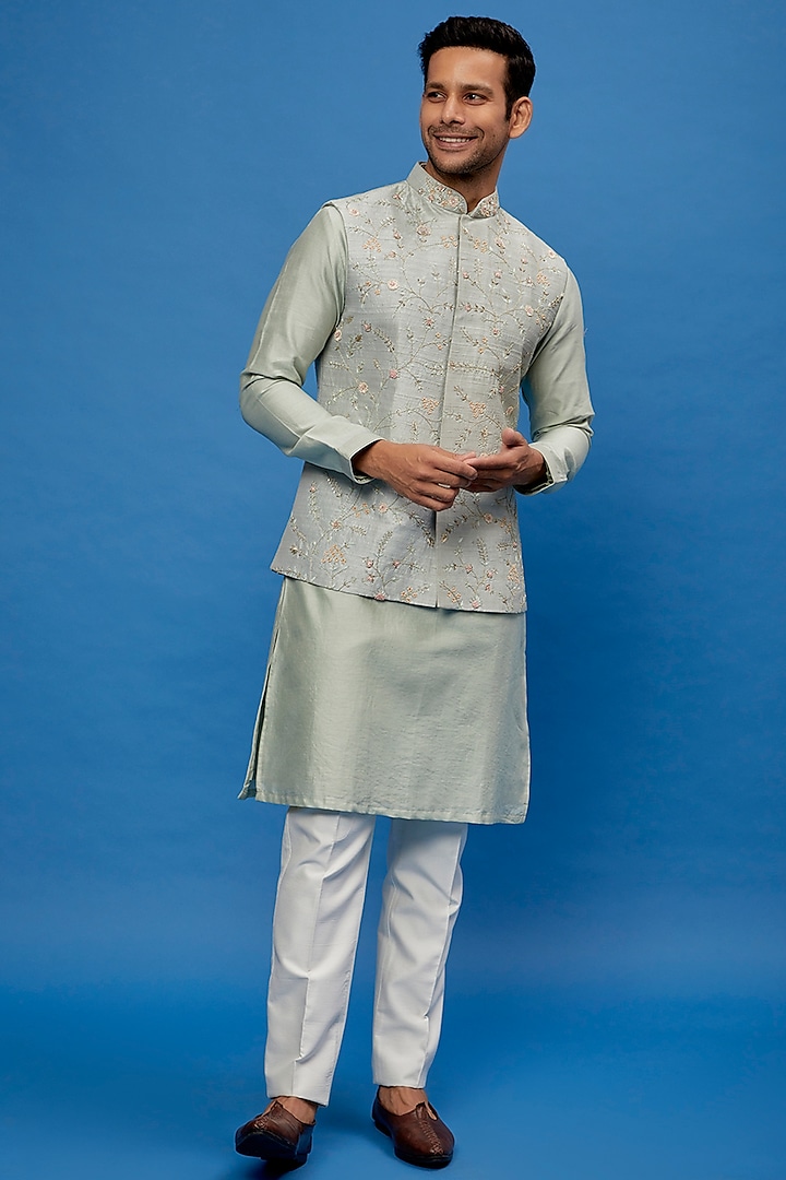 Blue Raw Silk Resham Embroidered Bundi Jacket Set by AUGUST by Swati Akash Jhunjhunwala