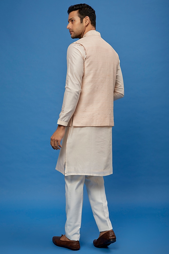 Powder Pink Raw Silk Embroidered Bundi Jacket Set by AUGUST by Swati Akash Jhunjhunwala at Pernia's Pop Up Shop