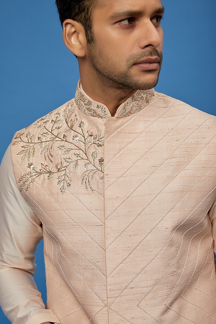 Powder Pink Raw Silk Embroidered Bundi Jacket Set by AUGUST by Swati Akash Jhunjhunwala at Pernia's Pop Up Shop