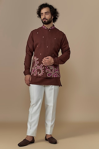 Burnt Orange Terry wool Kashmiri Embroidered Bundi Jacket Set by AUGUST by Swati Akash Jhunjhunwala
