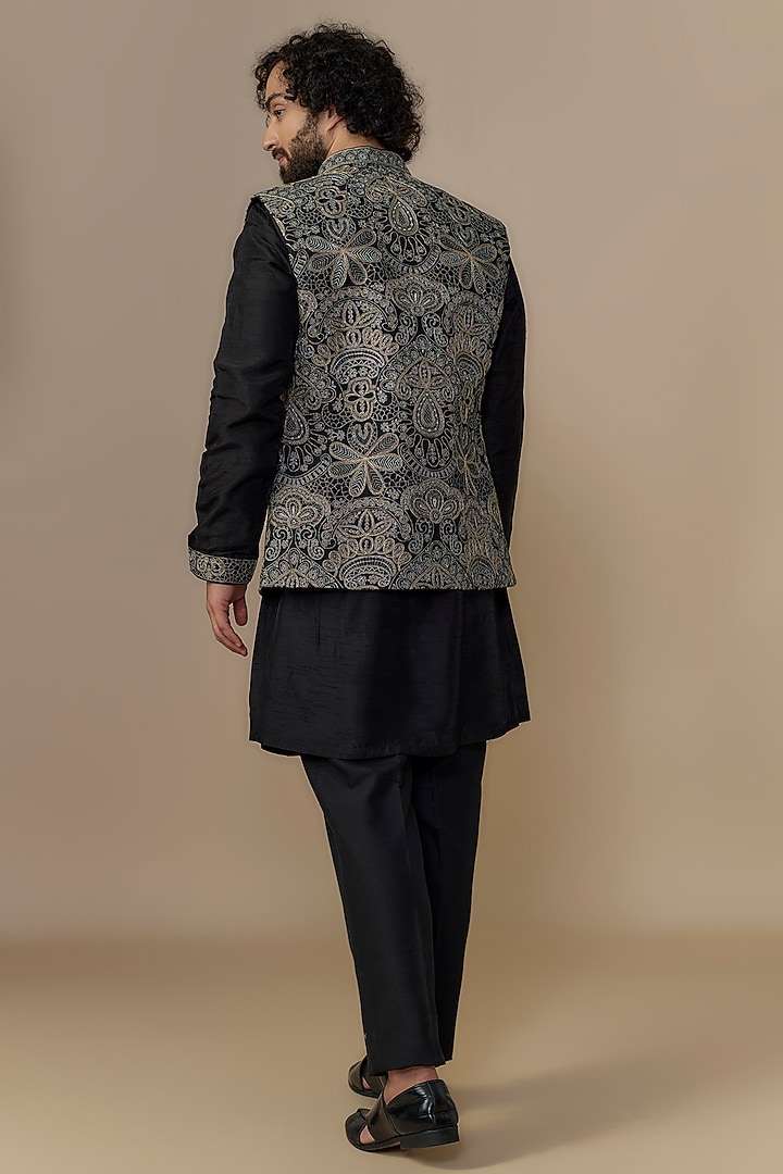 Black Blended Dupion Zari Embroidered Bundi Jacket Set by AUGUST by Swati Akash Jhunjhunwala at Pernia's Pop Up Shop