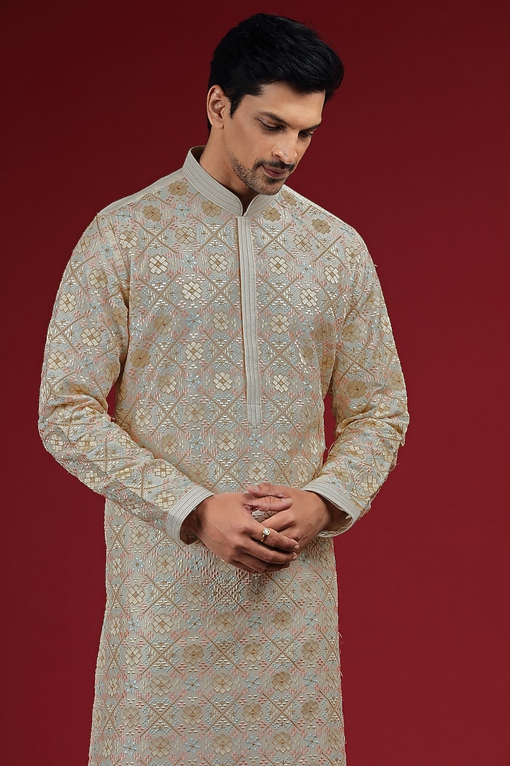 Ivory Silk Blend Patola Embroidered Kurta Set by AUGUST by Swati Akash Jhunjhunwala at Pernia's Pop Up Shop