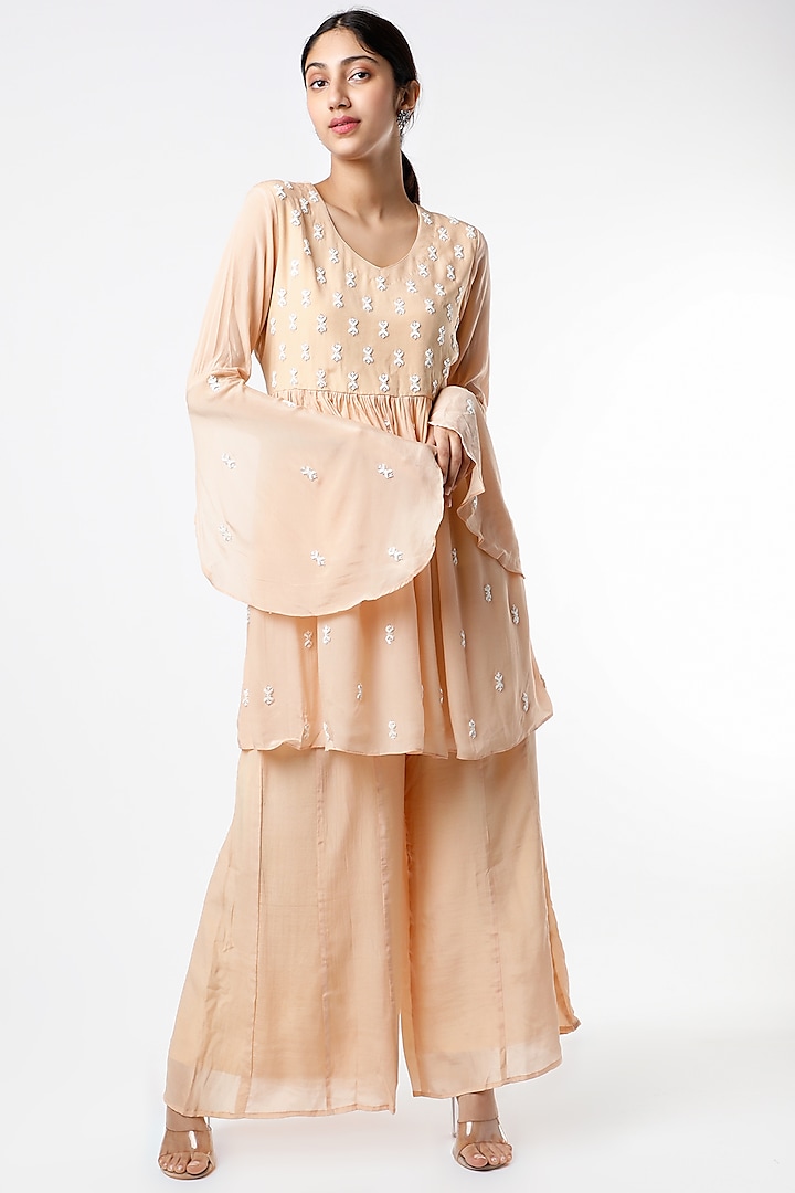 Blush Pink Peplum Kurta Set With Sequins Work by Adara By Sheytal at Pernia's Pop Up Shop