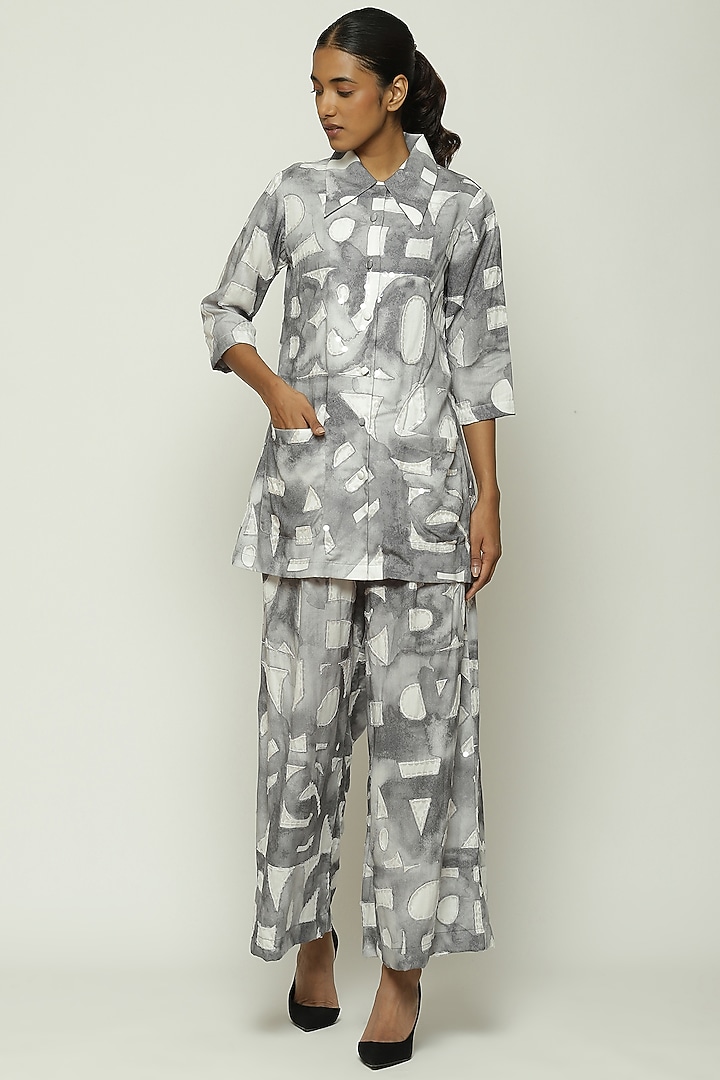 White Tencel Digital Printed Palazzo Pants by Abraham & Thakore at Pernia's Pop Up Shop