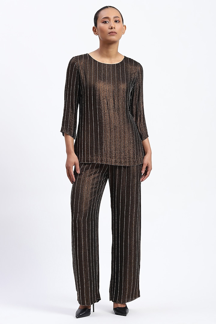 Metallic Gold Georgette Printed & Embellished Trousers by Abraham & Thakore at Pernia's Pop Up Shop