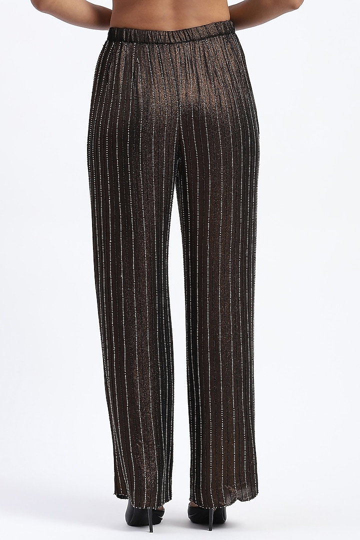 Metallic Gold Georgette Printed & Embellished Trousers by Abraham & Thakore at Pernia's Pop Up Shop