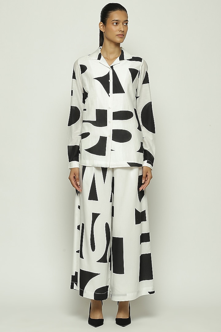 White Tencel Cotton Printed Palazzo Pants by Abraham & Thakore at Pernia's Pop Up Shop
