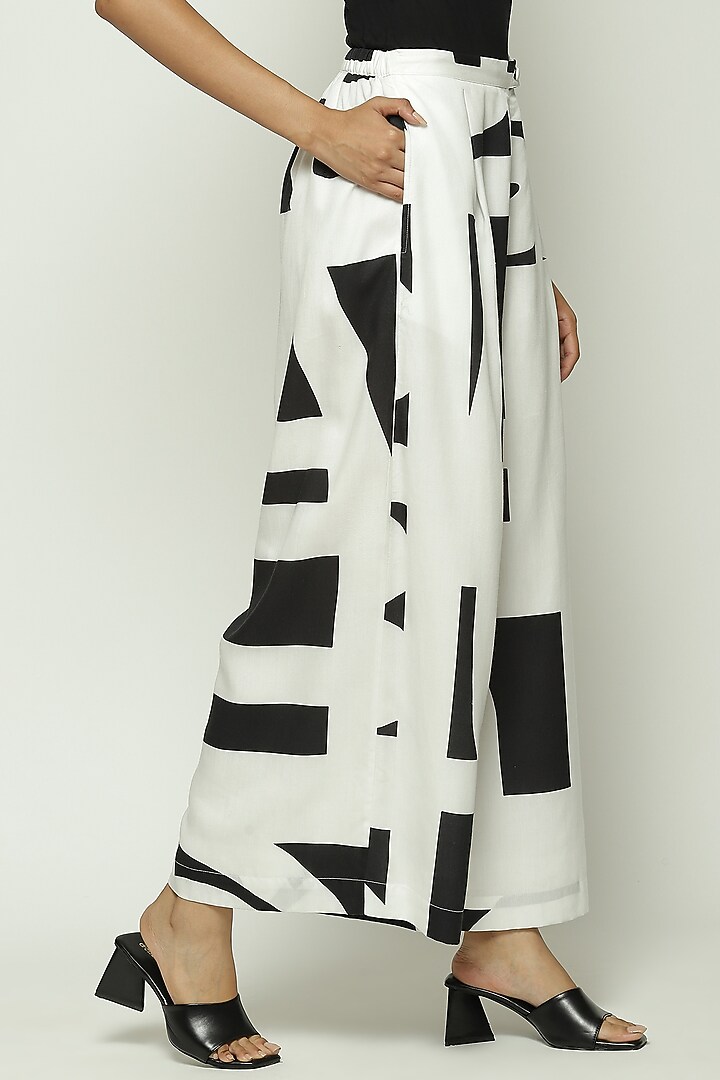 White Tencel Cotton Printed Palazzo Pants by Abraham & Thakore at Pernia's Pop Up Shop