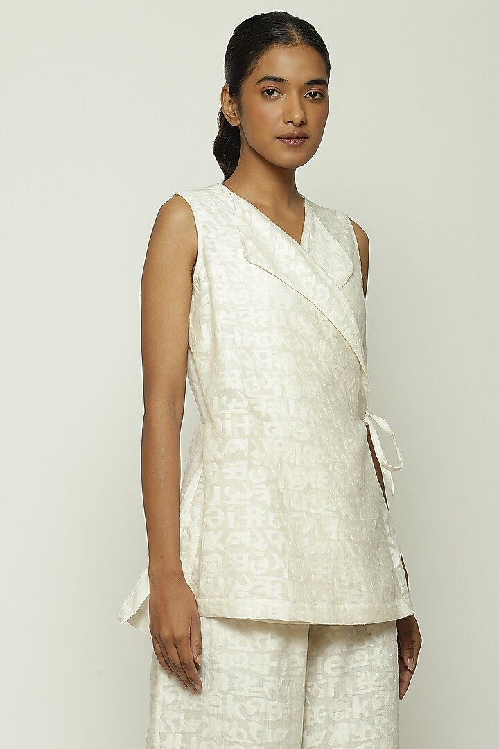 Ivory Handwoven Silk & Cotton Cutwork Wrap Top by Abraham & Thakore at Pernia's Pop Up Shop