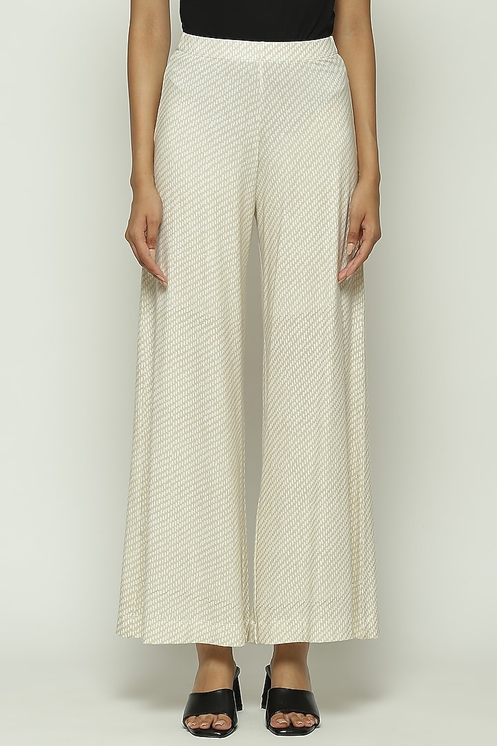 Ecru Lycra & Tencel Printed Pants by Abraham & Thakore at Pernia's Pop Up Shop