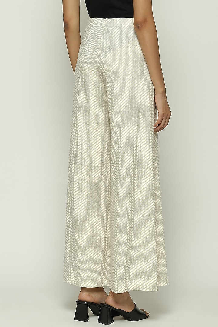 Ecru Lycra & Tencel Printed Pants by Abraham & Thakore at Pernia's Pop Up Shop