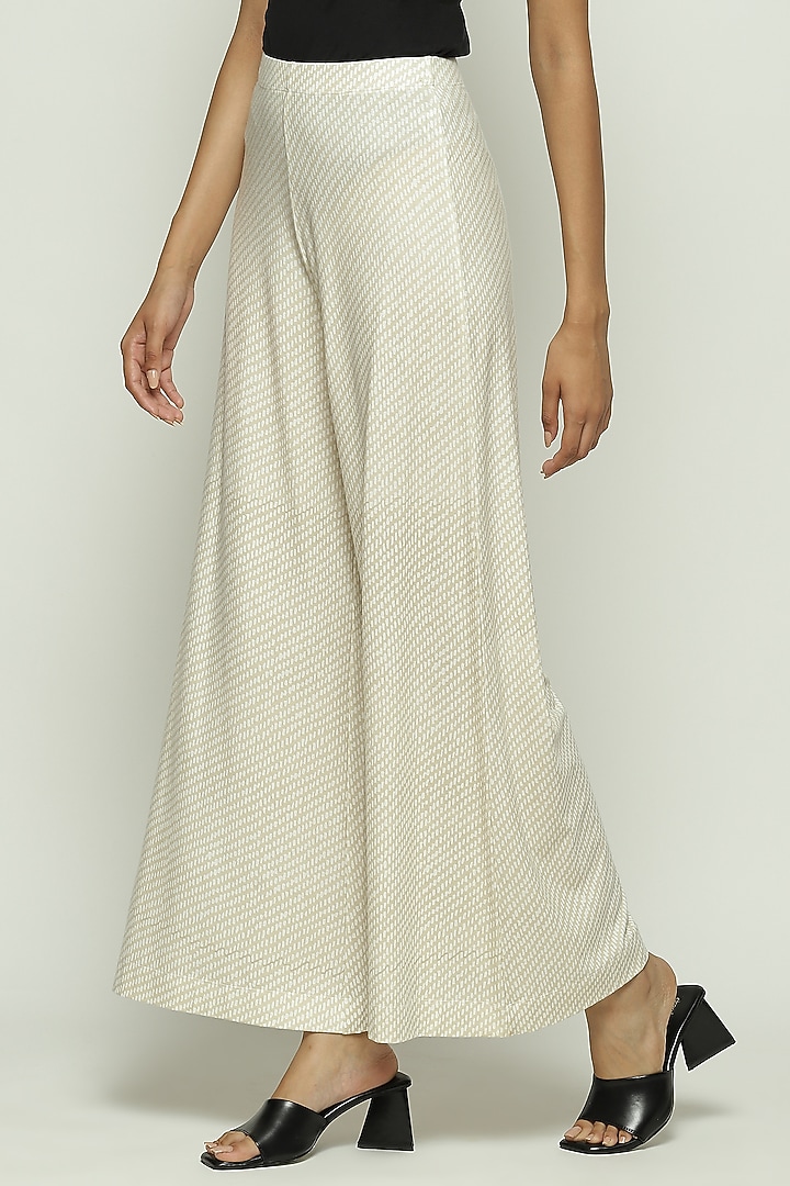Ecru Lycra & Tencel Printed Pants by Abraham & Thakore at Pernia's Pop Up Shop