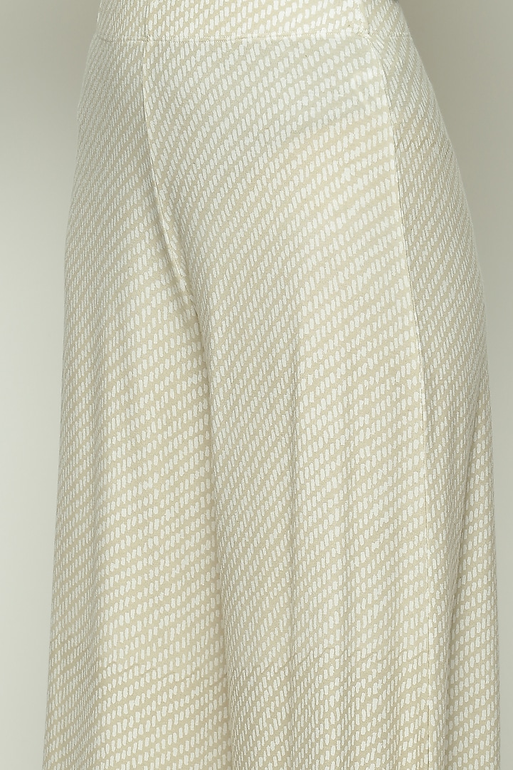 Ecru Lycra & Tencel Printed Pants by Abraham & Thakore at Pernia's Pop Up Shop