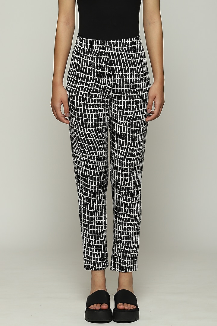 Black Lycra & Tencel Printed Pants by Abraham & Thakore at Pernia's Pop Up Shop