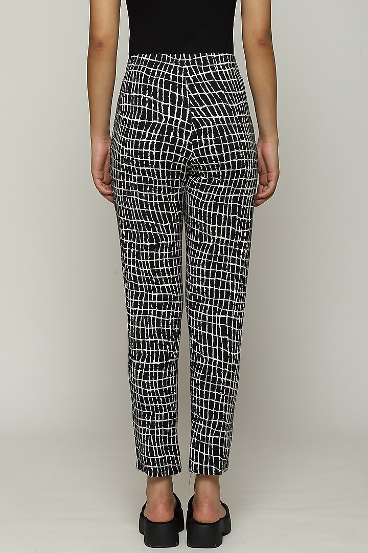 Black Lycra & Tencel Printed Pants by Abraham & Thakore at Pernia's Pop Up Shop