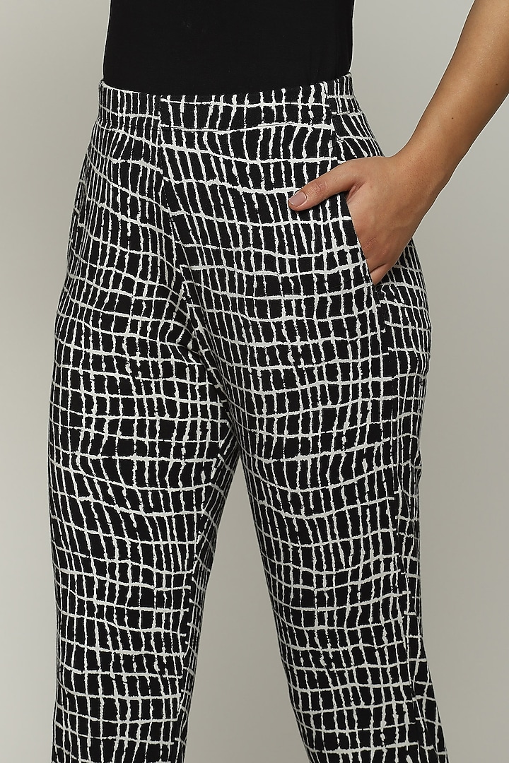 Black Lycra & Tencel Printed Pants by Abraham & Thakore at Pernia's Pop Up Shop