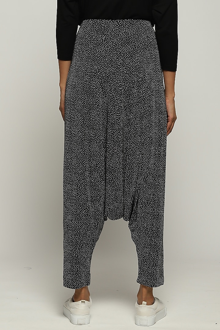 Black Lycra & Tencel Printed Pants by Abraham & Thakore at Pernia's Pop Up Shop