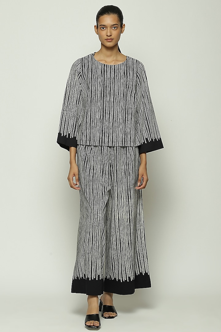 Black Voile Screen Printed Palazzo Pant by Abraham & Thakore at Pernia's Pop Up Shop