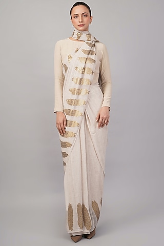 Beige Viscose Georgette Motif Hand Embroidered Ikat Saree by Abraham & Thakore