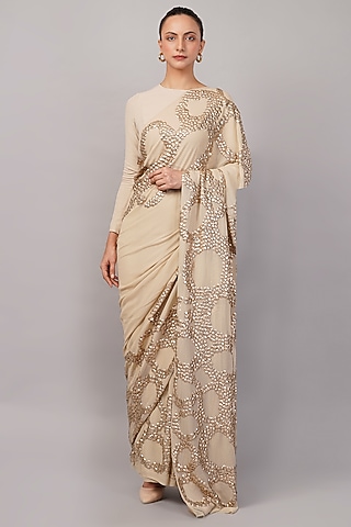 Beige Organza Metallic Sequins Hand Embroidered Saree by Abraham & Thakore