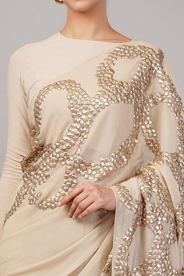 Beige Organza Metallic Sequins Hand Embroidered Wedding Saree by Abraham & Thakore at Pernia's Pop Up Shop