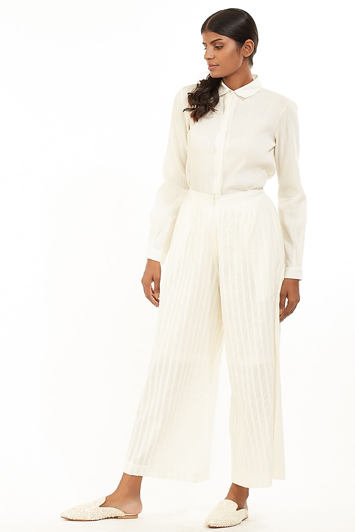 Ivory Pleated Cambric Pants by Abraham & Thakore