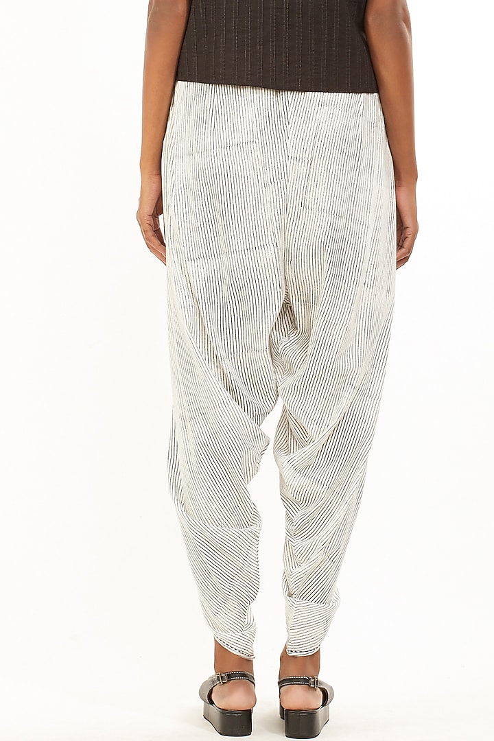 White Printed Dhoti Pants by Abraham & Thakore at Pernia's Pop Up Shop