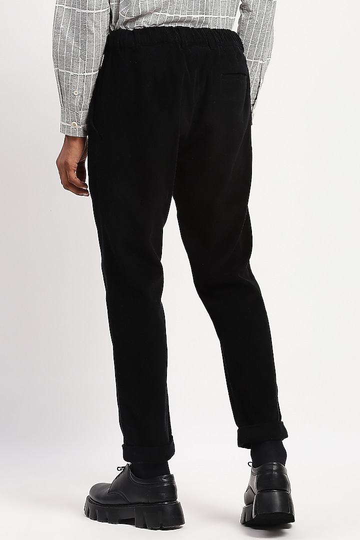 Black Corduroy Crafted Trousers by Abraham & Thakore Men at Pernia's Pop Up Shop