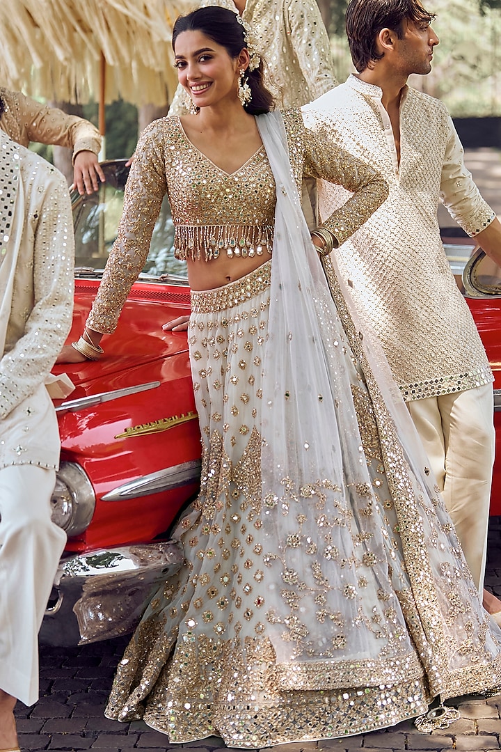 Ivory Net Sequins Embroidered Bridal Lehenga Set by Abhinav Mishra at Pernia's Pop Up Shop