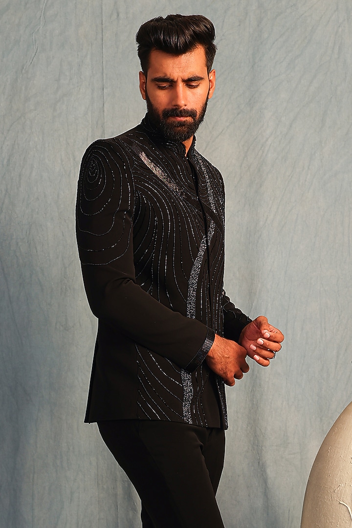 Black Italian Fabric Sequins Embroidered Bandhgala Set by ACHKANN at Pernia's Pop Up Shop