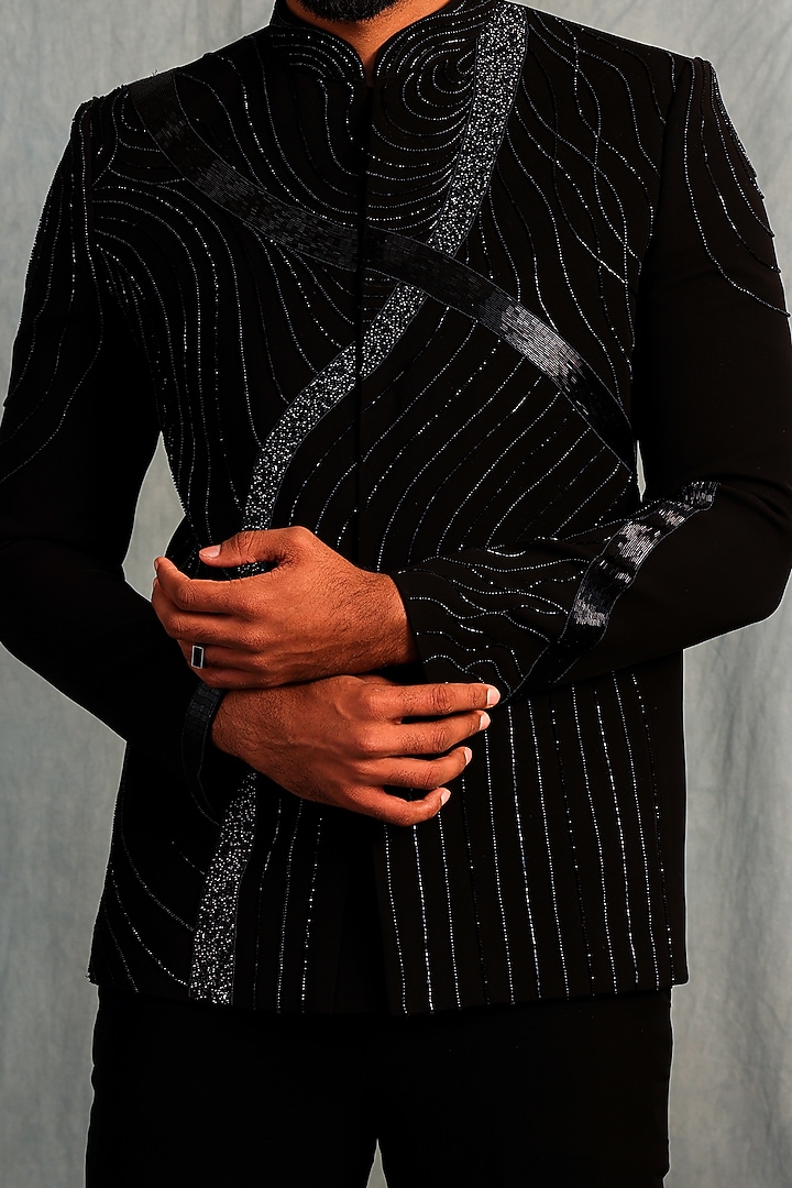 Black Italian Fabric Sequins Embroidered Bandhgala Set by ACHKANN at Pernia's Pop Up Shop