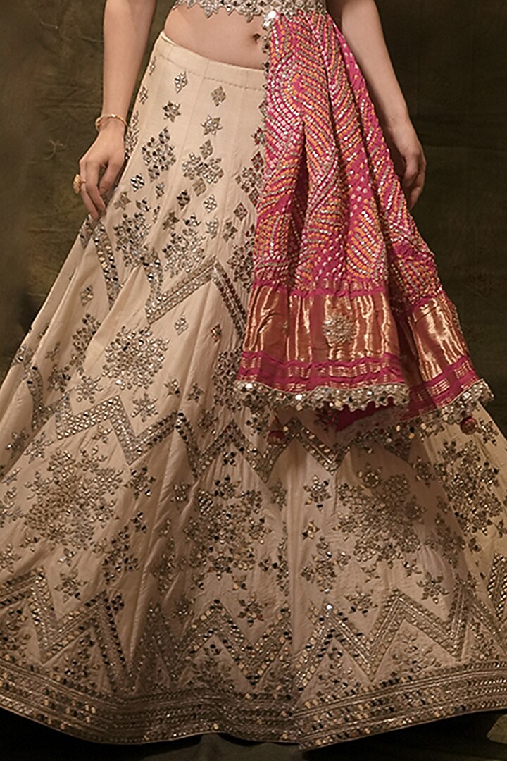 Ivory Raw Silk Bandhani Printed & Mirror Embroidered Bridal Lehenga Set by Archana Kochhar at Pernia's Pop Up Shop