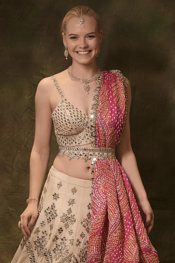 Ivory Raw Silk Bandhani Printed & Mirror Embroidered Bridal Lehenga Set by Archana Kochhar at Pernia's Pop Up Shop