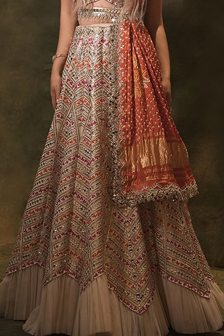 Ivory Raw Silk Bandhani Printed & Mirror Embroidered Wedding Lehenga Set by Archana Kochhar at Pernia's Pop Up Shop