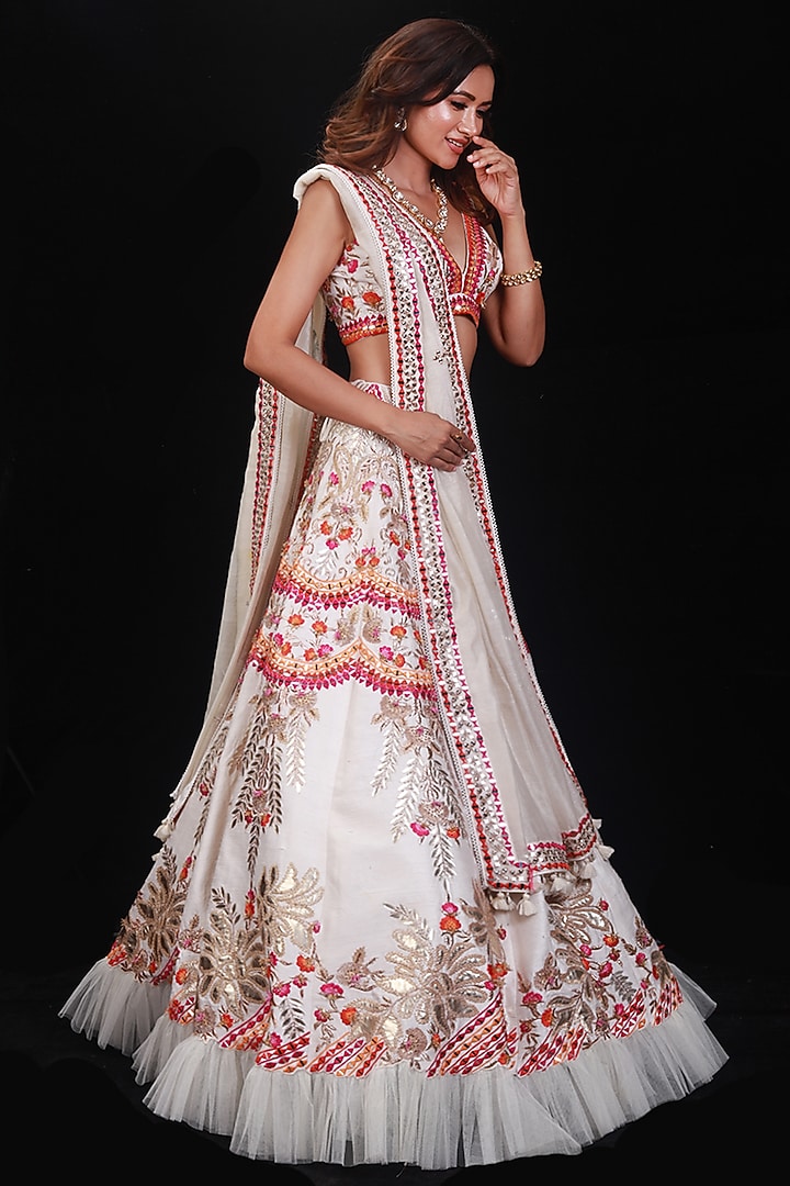 Ivory Hand Embroidered Wedding Lehenga Set by Archana Kochhar at Pernia's Pop Up Shop