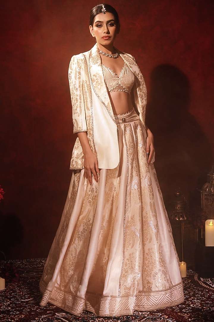 Ivory Brocade Silk & Raw Silk Embroidered Wedding Lehenga Set by Archana Kochhar at Pernia's Pop Up Shop