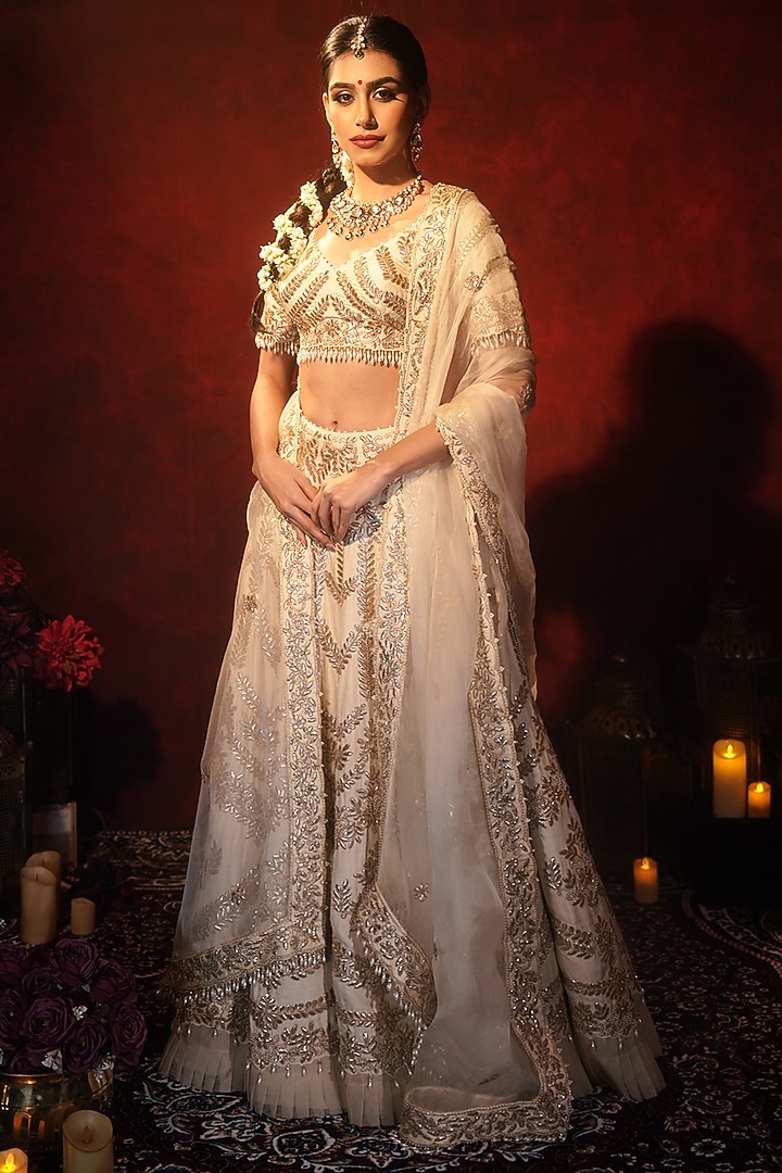 Ivory Raw Silk Embroidered Bridal Lehenga Set by Archana Kochhar at Pernia's Pop Up Shop