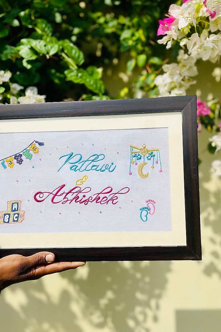 Yellow Sheesham Wood & Glass Hand Embroidered Name Frame by ACE THE SPACE at Pernia's Pop Up Shop