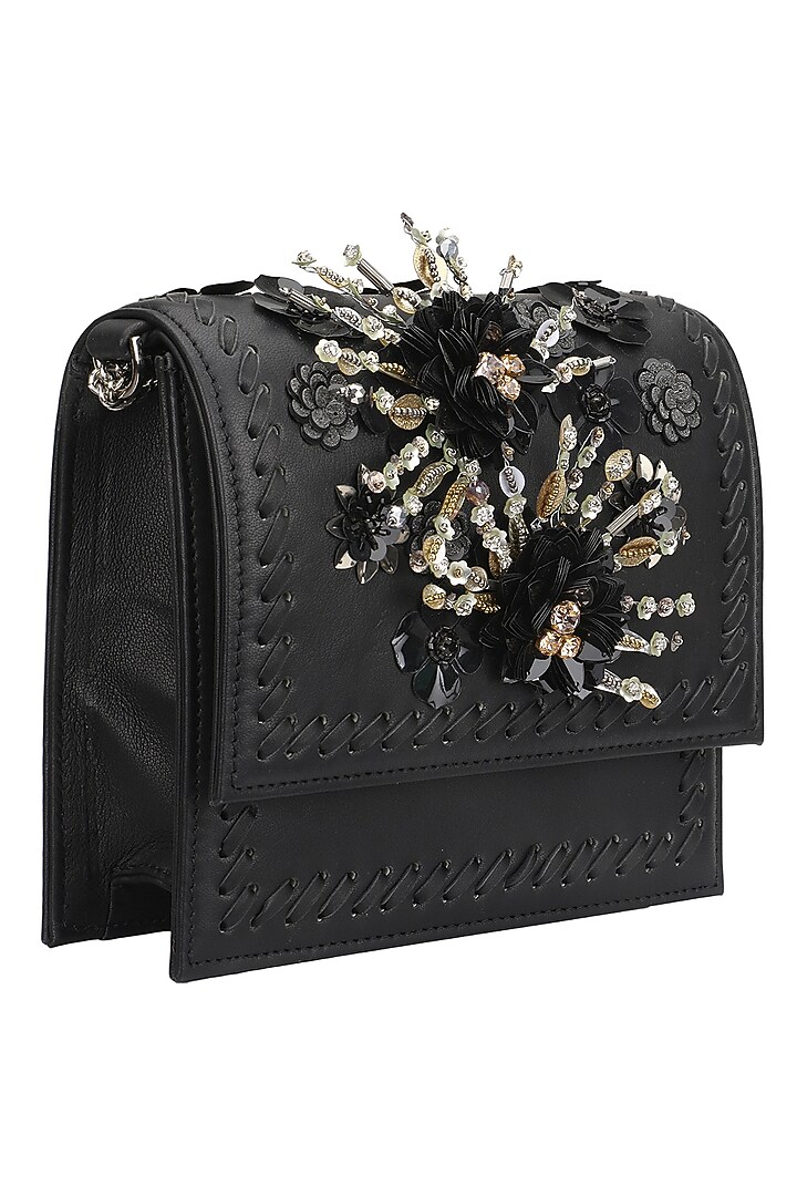 Studio Accessories presents Black tone on tone floral motif clutch available only at Pernia's Pop Up Shop.