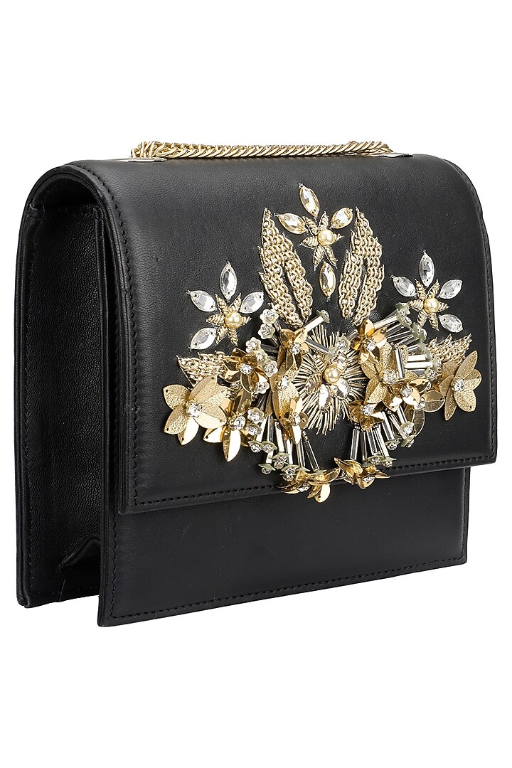 Studio Accessories presents Black and gold crystal and sequins floral motif clutch available only at Pernia's Pop Up Shop.