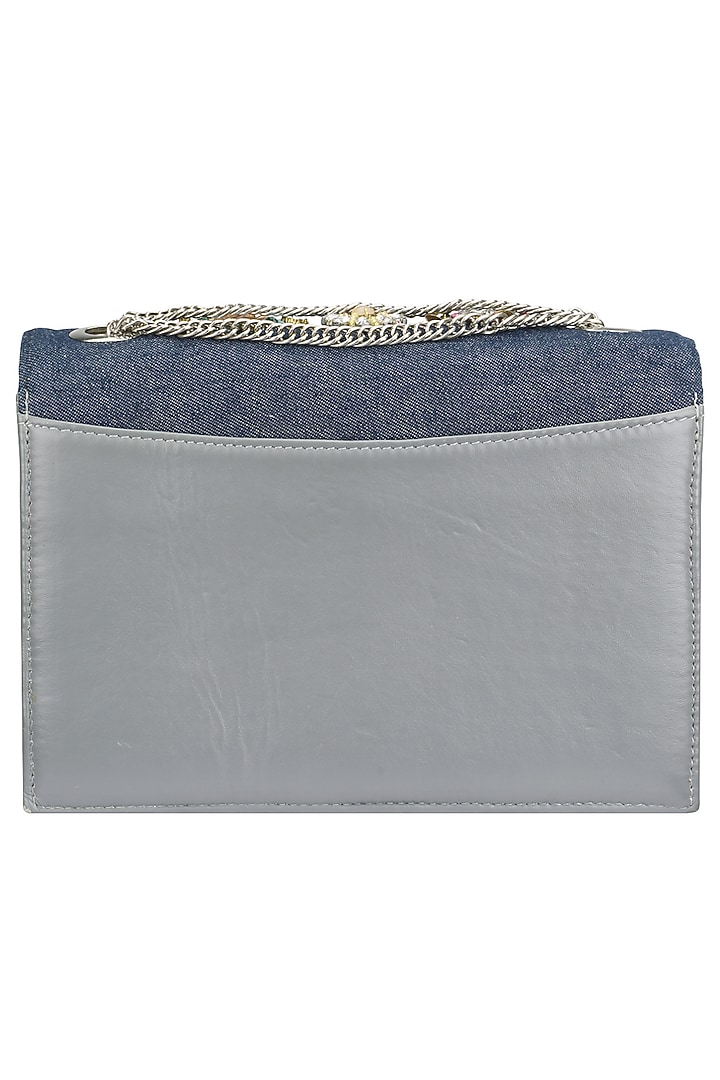 Studio Accessories presents Black and denim floral motif clutch bag available only at Pernia's Pop Up Shop.